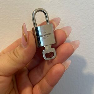 SOLD AUTHENTIC Louis Vuitton silver padlock